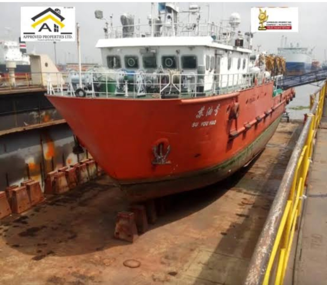 MV SUYOUHAO (SU YOU HAO) in dry dock showing red hull and forward deck