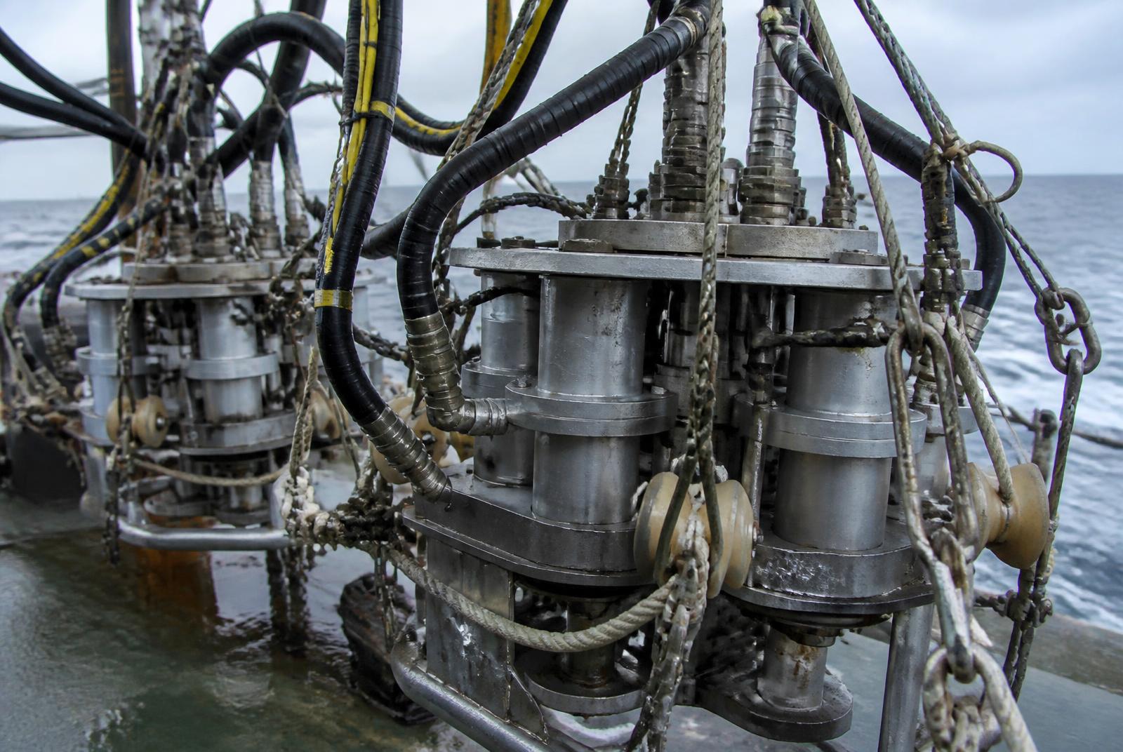 Marine seismic airgun array equipment on a survey vessel deck